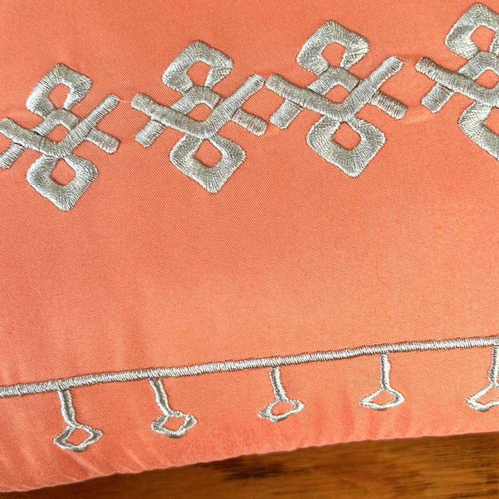 Jessica Simpson accent pillow.  Orange w/tan embroidery on one side.  12”x16.5”